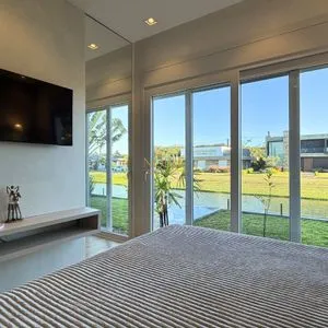 Casa de Condomínio com 206m², 4 dormitórios, 4 suítes, 2 vagas no Reserva das Águas em Torres para Comprar