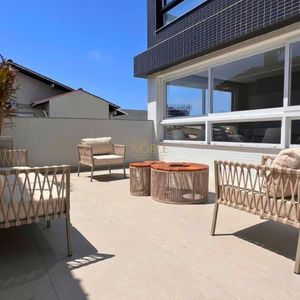 Apartamento com 72m², 2 dormitórios, 1 suíte, 1 vaga no Topazio em Torres para Comprar