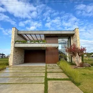 Casa de Condomínio com 277m², 3 dormitórios, 3 suítes, 2 vagas no Reserva das Águas em Torres para Comprar