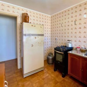 Apartamento com 82m², 2 dormitórios, 1 vaga no Edifício Dona Emília em Torres para Comprar