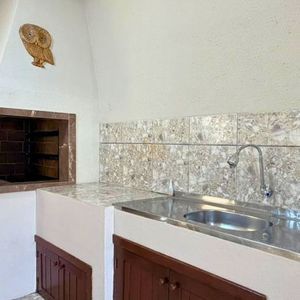 Casa com 171m², 4 dormitórios, 3 vagas no bairro Porto Alegre em Torres para Comprar