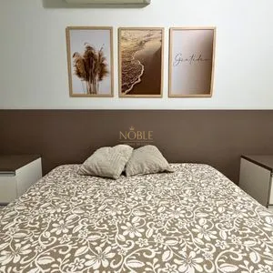 Apartamento com 124m², 3 dormitórios, 3 suítes, 2 vagas no Lê Classic em Torres para Comprar