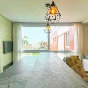 Apartamento com 204m², 3 dormitórios, 1 suíte, 2 vagas no Morada da Cal em Torres para Comprar