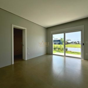 Casa de Condomínio com 264m², 4 dormitórios, 4 suítes, 2 vagas no Reserva das Águas em Torres para Comprar