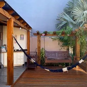 Casa com 243m², 4 dormitórios, 1 suíte, 2 vagas no bairro Stan em Torres para Comprar