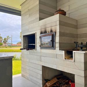 Casa de Condomínio com 348m², 4 dormitórios, 3 suítes, 2 vagas no Condomínio Ilhas Park em Torres para Comprar