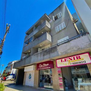 Apartamento com 82m², 2 dormitórios, 1 vaga no Edifício Dona Emília em Torres para Comprar