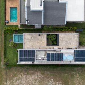 Casa de Condomínio com 244m², 4 dormitórios, 4 suítes, 2 vagas no Condomínio Ilhas Park em Torres para Comprar