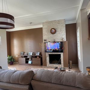 Sobrado com 290m², 4 dormitórios, 1 suíte, 2 vagas no bairro Igra Norte em Torres para Comprar