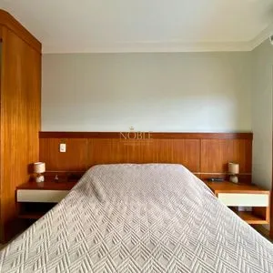 Casa com 272m², 4 dormitórios, 1 suíte, 3 vagas no bairro Igra Norte em Torres para Comprar