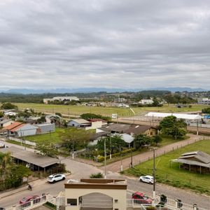 Apartamento com 59m², 2 dormitórios, 1 suíte, 1 vaga no Residencial Jardim Europa em Torres para Comprar