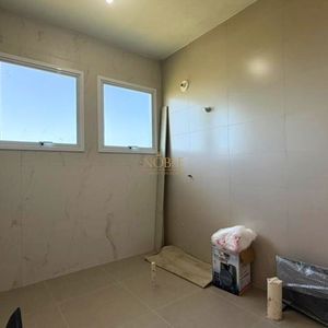 Casa com 226m², 3 dormitórios, 1 suíte, 2 vagas no bairro Paraíso em Torres para Comprar