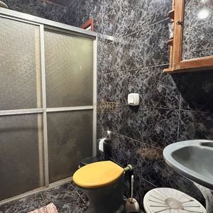Casa, 3 dormitórios, 2 vagas no bairro Centro em Torres para Comprar