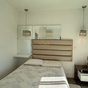 Casa com 400m², 5 dormitórios, 1 suíte, 4 vagas no bairro Stan em Torres para Comprar