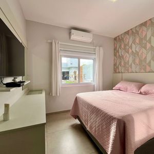 Casa com 670m², 5 dormitórios, 3 suítes, 3 vagas no bairro Bellatorres em Passo de Torres para Comprar