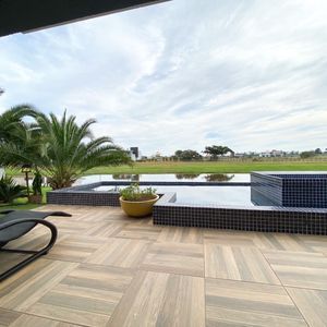 Casa de Condomínio com 330m², 3 dormitórios, 3 suítes, 2 vagas no Reserva das Águas em Torres para Comprar