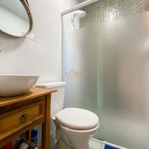 Casa com 102m², 2 dormitórios, 1 suíte, 2 vagas no bairro Igra Sul em Torres para Comprar