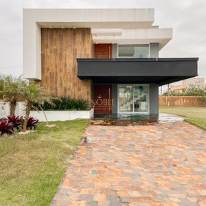 Casa de Condomínio com 294m², 5 dormitórios, 5 suítes, 2 vagas no Condomínio Ilhas Park em Torres para Comprar