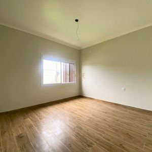 Casa com 118m², 2 dormitórios, 1 suíte, 2 vagas no bairro Novo Passo em Passo de Torres para Comprar