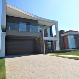 Casa de Condomínio com 301m², 4 dormitórios, 4 suítes, 2 vagas no Reserva das Águas em Torres para Comprar