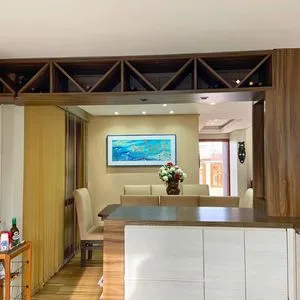 Casa com 272m², 4 dormitórios, 1 suíte, 3 vagas no bairro Igra Norte em Torres para Comprar