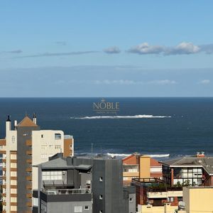 Apartamento com 98m², 2 dormitórios, 2 suítes, 2 vagas no Punta Del Sole em Torres para Comprar