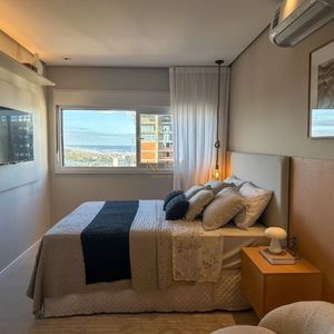 Apartamento com 70m², 2 dormitórios, 1 suíte, 2 vagas no Toronto em Torres para Comprar