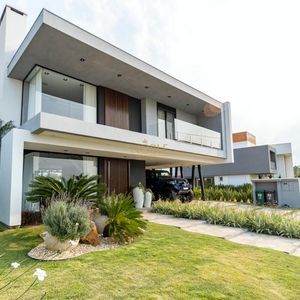 Casa de Condomínio com 373m², 3 dormitórios, 3 suítes, 2 vagas no Reserva das Águas em Torres para Comprar