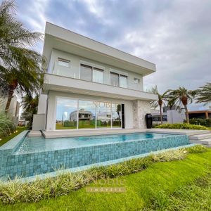 Casa de Condomínio com 432m², 4 dormitórios, 3 suítes, 2 vagas no Reserva das Águas em Torres para Comprar