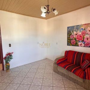 Casa, 6 dormitórios, 2 vagas no bairro Praia da Cal em Torres para Comprar