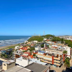 Apartamento com 119m², 3 dormitórios, 3 suítes, 2 vagas no La Vistara em Torres para Comprar