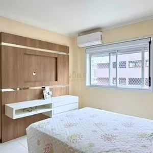 Apartamento com 127m², 3 dormitórios, 1 suíte, 2 vagas no Elegance em Torres para Comprar
