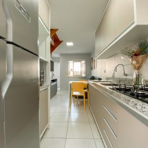 Sobrado com 54m², 2 dormitórios, 1 vaga no Residencial Bela Vista em Torres para Comprar