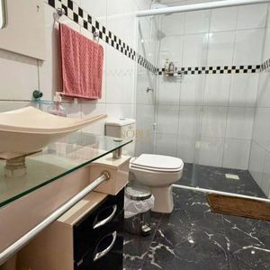 Casa com 145m², 3 dormitórios, 1 suíte, 2 vagas no bairro Igra Sul em Torres para Comprar