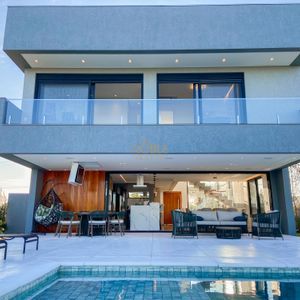 Casa de Condomínio com 375m², 4 dormitórios, 4 suítes, 2 vagas no Condomínio Ilhas Park em Torres para Comprar