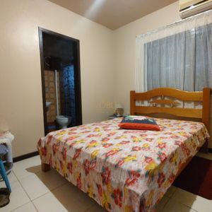 Casa, 6 dormitórios, 2 suítes, 3 vagas no bairro Getúlio Vargas em Torres para Comprar