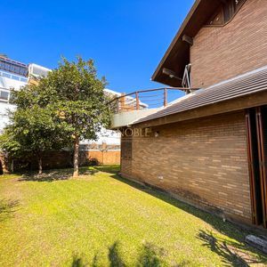 Casa, 4 dormitórios, 2 suítes, 3 vagas no bairro Praia Grande em Torres para Comprar