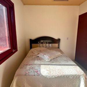 Casa, 6 dormitórios, 2 vagas no bairro Praia da Cal em Torres para Comprar