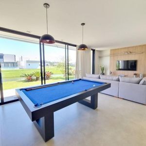 Casa de Condomínio com 350m², 3 dormitórios, 3 suítes, 2 vagas no Reserva das Águas em Torres para Comprar