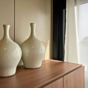 Apartamento com 64m², 2 dormitórios, 1 suíte, 1 vaga no Aston em Torres para Comprar