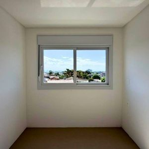 Apartamento com 118m², 3 dormitórios, 3 suítes, 1 vaga no Punta Del Sole em Torres para Comprar