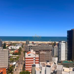 Apartamento com 88m², 3 dormitórios, 3 suítes, 2 vagas no Perito Moreno em Torres para Comprar