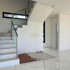 Casa com 272m², 3 dormitórios, 3 suítes, 4 vagas no bairro Itapeva em Torres para Comprar