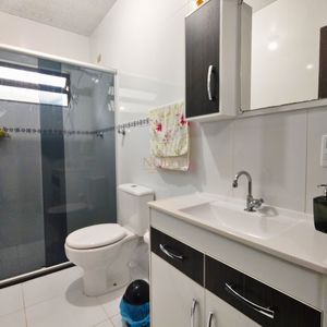 Casa, 6 dormitórios, 2 suítes, 3 vagas no bairro Getúlio Vargas em Torres para Comprar