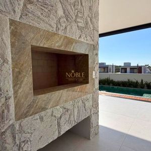 Casa com 335m², 4 dormitórios, 4 suítes, 2 vagas no Reserva das Águas em Torres para Comprar