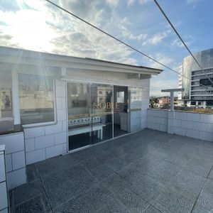 Casa com 500m², 7 dormitórios, 2 suítes, 2 vagas no bairro Centro em Torres para Comprar