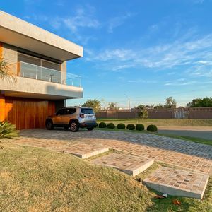 Casa de Condomínio com 375m², 4 dormitórios, 4 suítes, 2 vagas no Condomínio Ilhas Park em Torres para Comprar