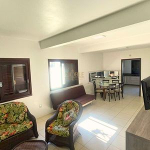 Casa com 240m², 4 dormitórios, 2 suítes, 2 vagas no bairro Praia Paraíso em Torres para Comprar