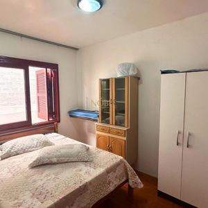 Casa, 6 dormitórios, 2 vagas no bairro Praia da Cal em Torres para Comprar