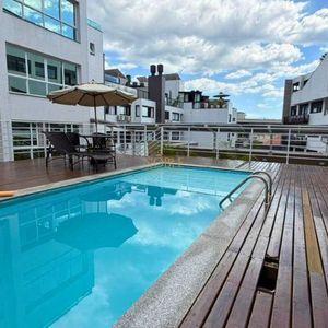 Duplex com 152m², 1 dormitório, 1 suíte, 2 vagas no Lumiere em Torres para Comprar
